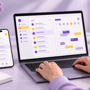 Laptop and phone showing an organized business inbox and calendar